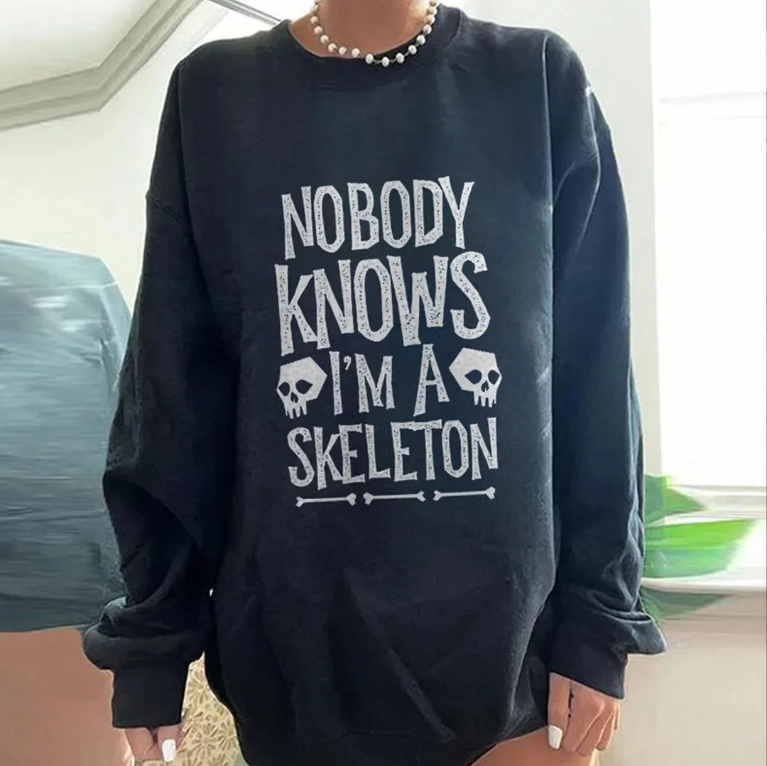 NOBODY KNOWS I’M A SKELETON Letter Graphic  Black Print Sweatshirt