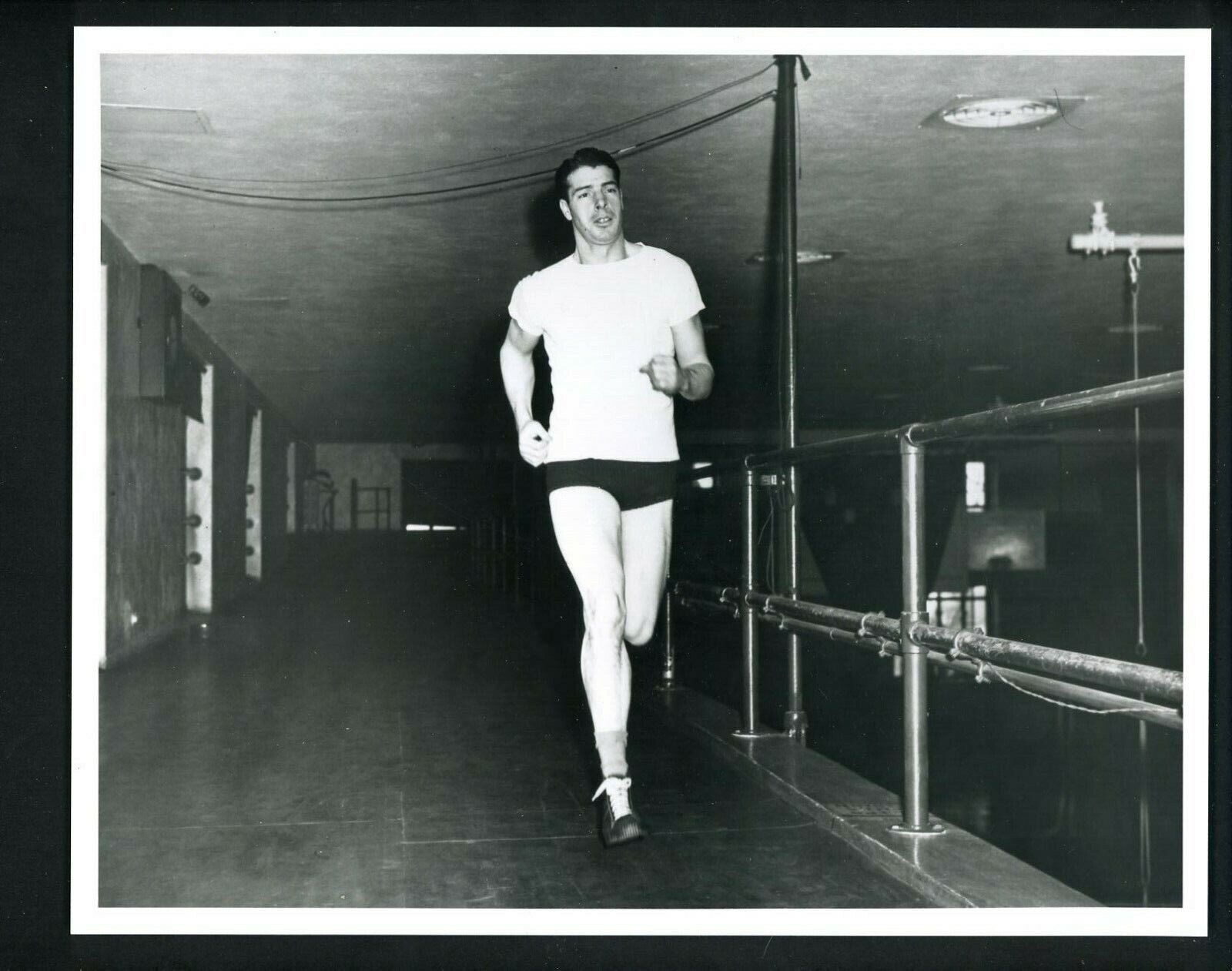 Joe DiMaggio running during workout 1940's Type IV Press Photo Poster painting New York Yankees