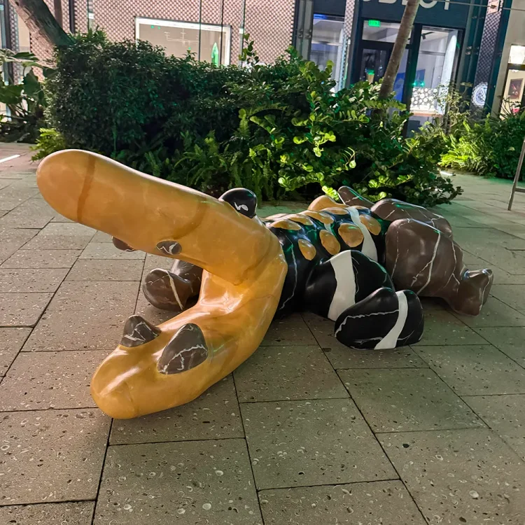 Crocodile sculpture, outdoor art piece suitable for commercial spaces.