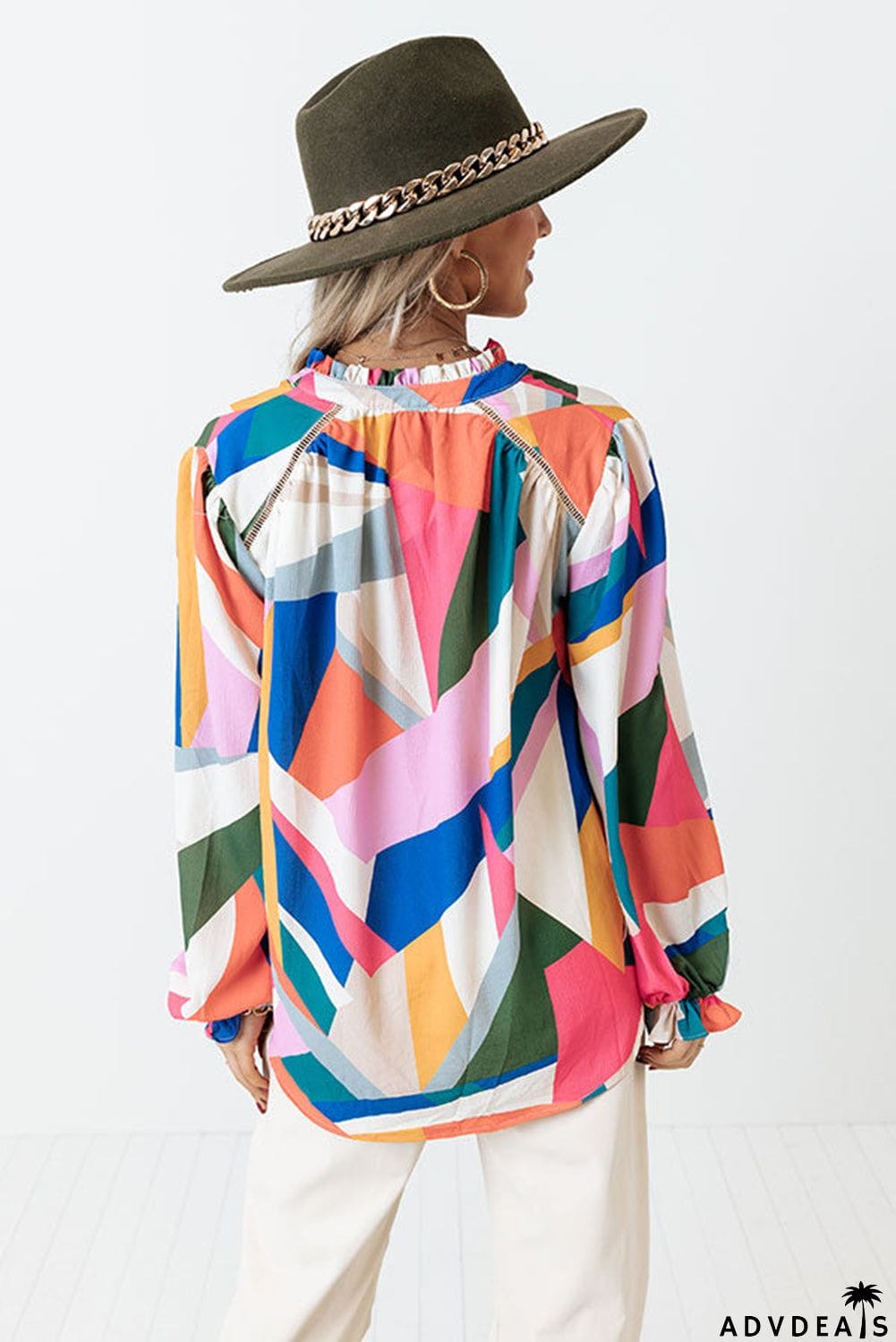 Geometric Patchwork Print Half Buttoned Blouse
