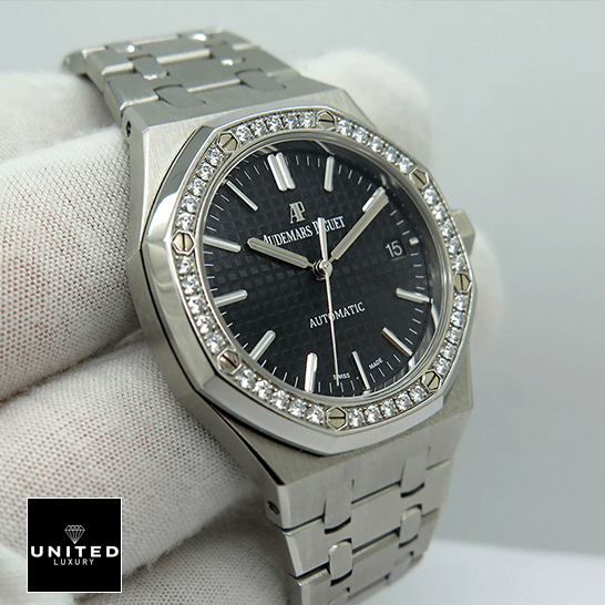 Audemars Piguet Diamond Bezel Black Background Replica on the hand