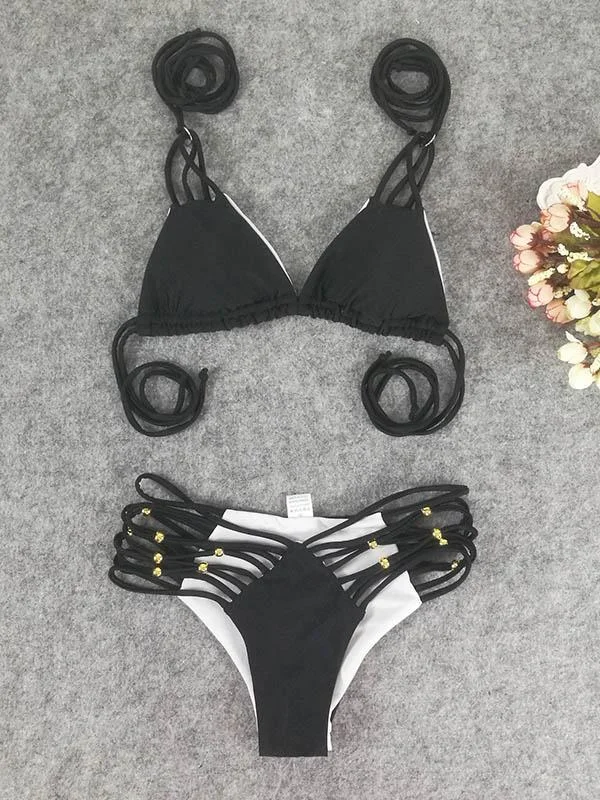 Sexy Hollow Bandage Split Type Bikini Swimsuit