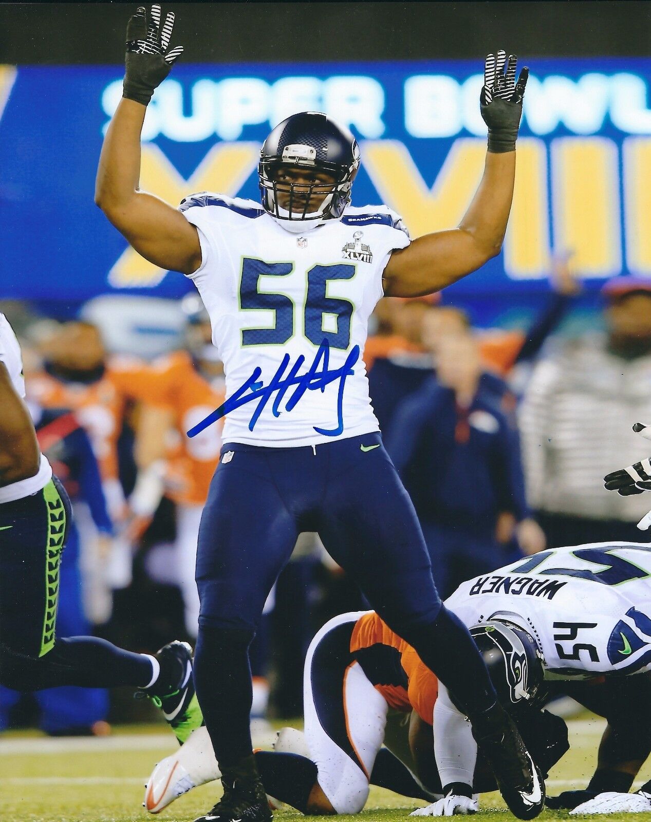 Autographed CLIFF AVRIL Seattle Seahawks 8x10 Photo Poster painting w/COA