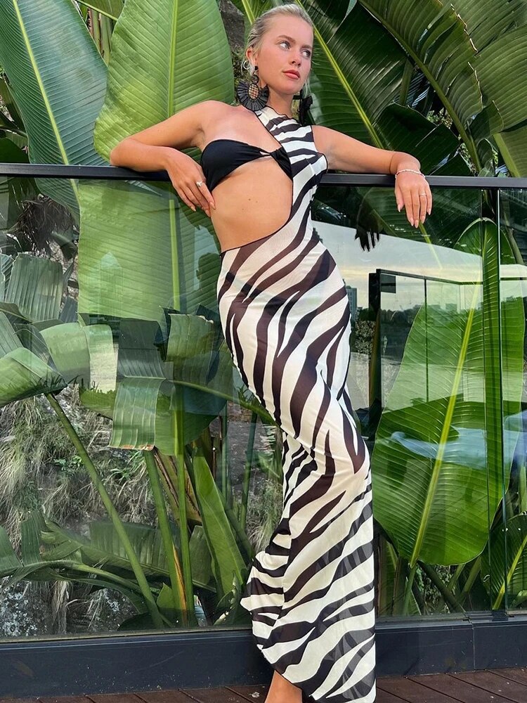 Hugcitar Mesh Sleeveless Striped Print Matching Color Hollow Out Sexy Maxi Dress Irregular Summer Women Beach Festival Outfit