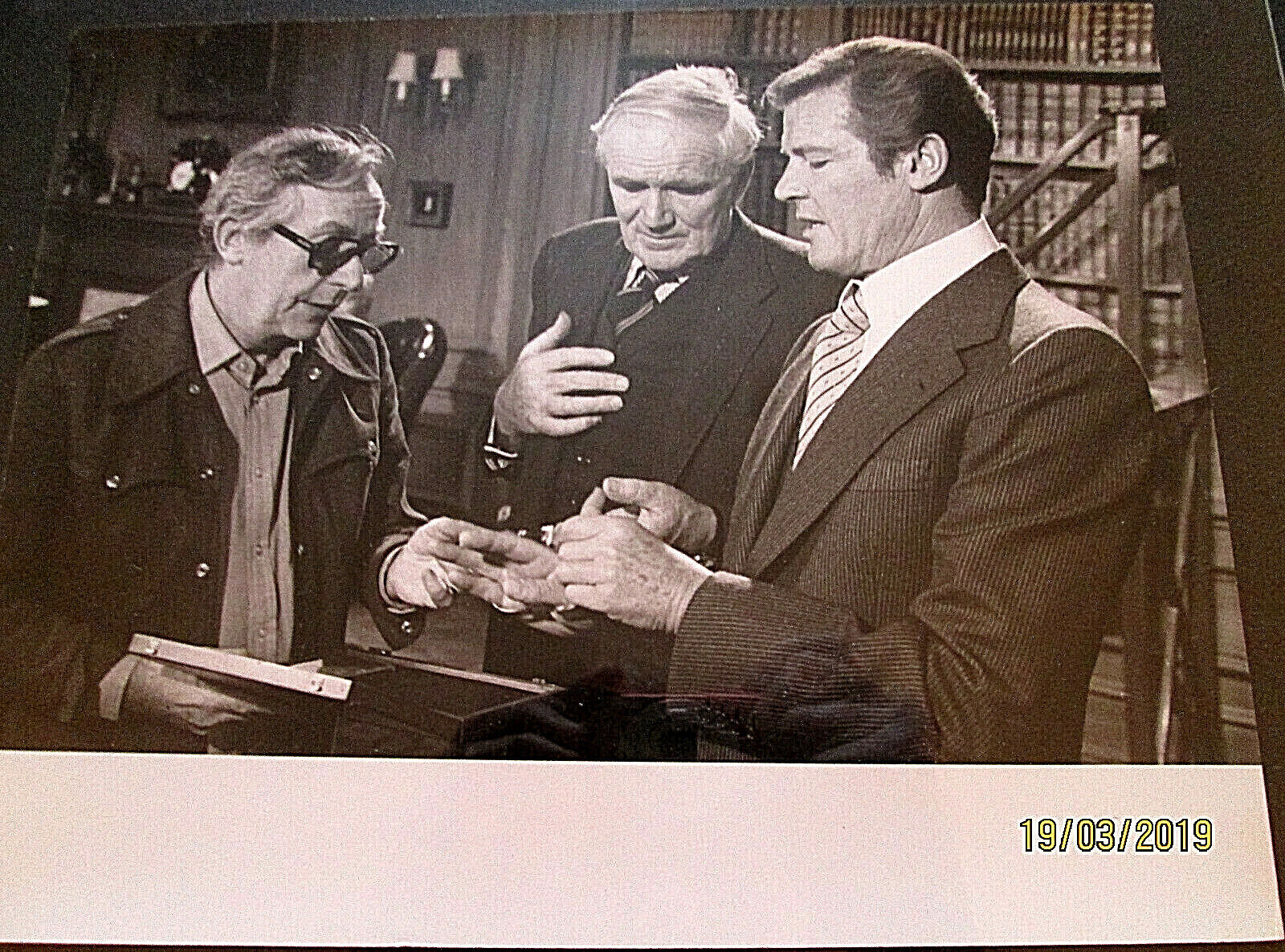 ROGER MOORE,DESMOND LIEWELYN AS Q:L.GILBERT:DIR (MOONRAKER)ON THE SET Photo Poster painting