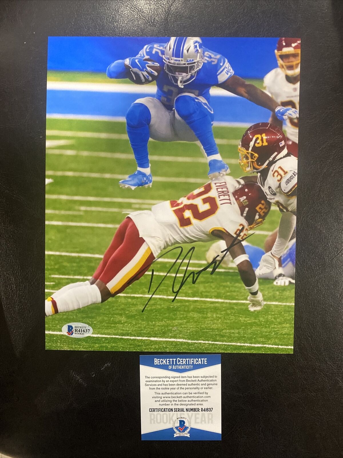 D’Andre Swift Signed Leap Photo Poster painting 8x10 Detroit Lions Signed Swift Signed