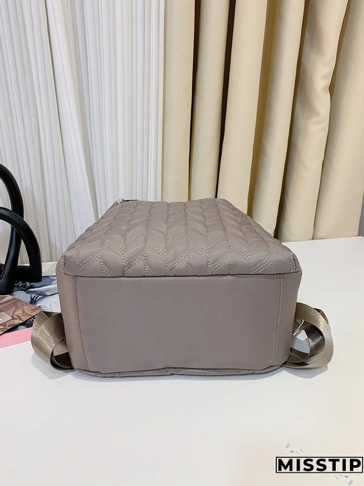 Metal Decor Quilted Backpack