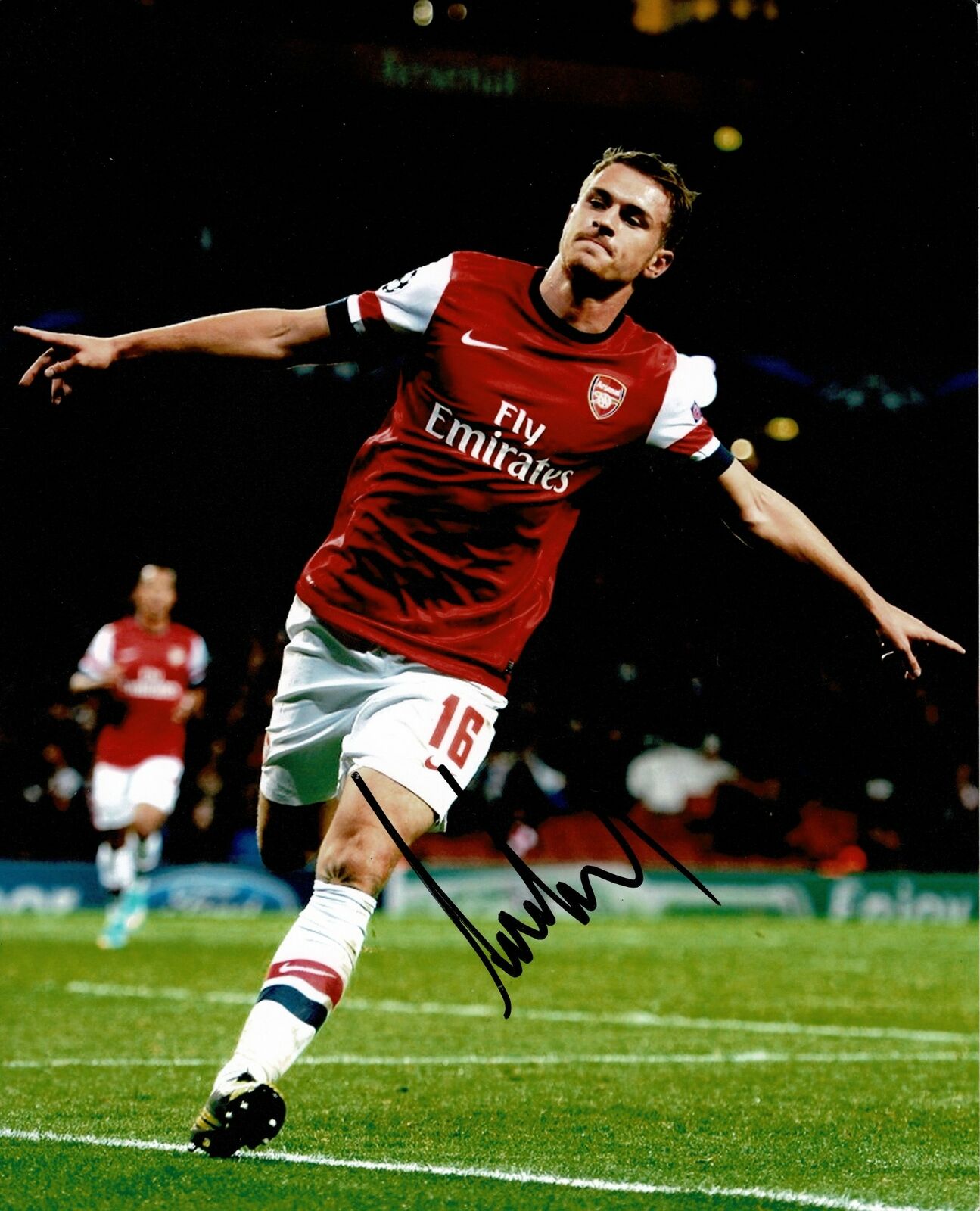 Aaron Ramsey Signed 10X8 Photo Poster painting Arsenal F.C. Genuine Signature AFTAL COA (1196)