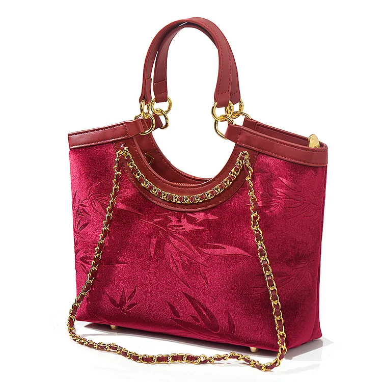 Red embroidered jacquard handbag