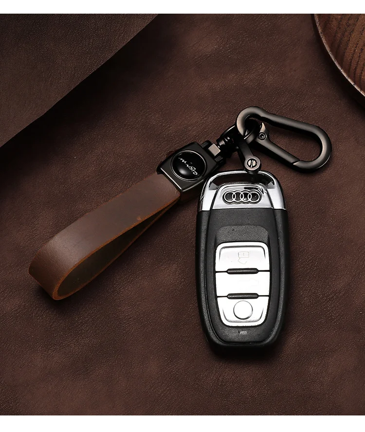 🔥Hot sale🔥Exclusive logo🔥Car anti-lost genuine leather alloy keychain