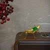 Handcrafted Gilded Grasshopper Art Piece: Materials and Craftsmanship