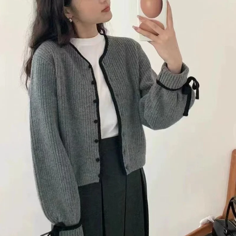 Ueong Ueong Retro Simple Temperament Knit Cardigan Female Sleeve Lace Spell Color Edge Single Breasted Soft Waxy Long Sleeve Jacket