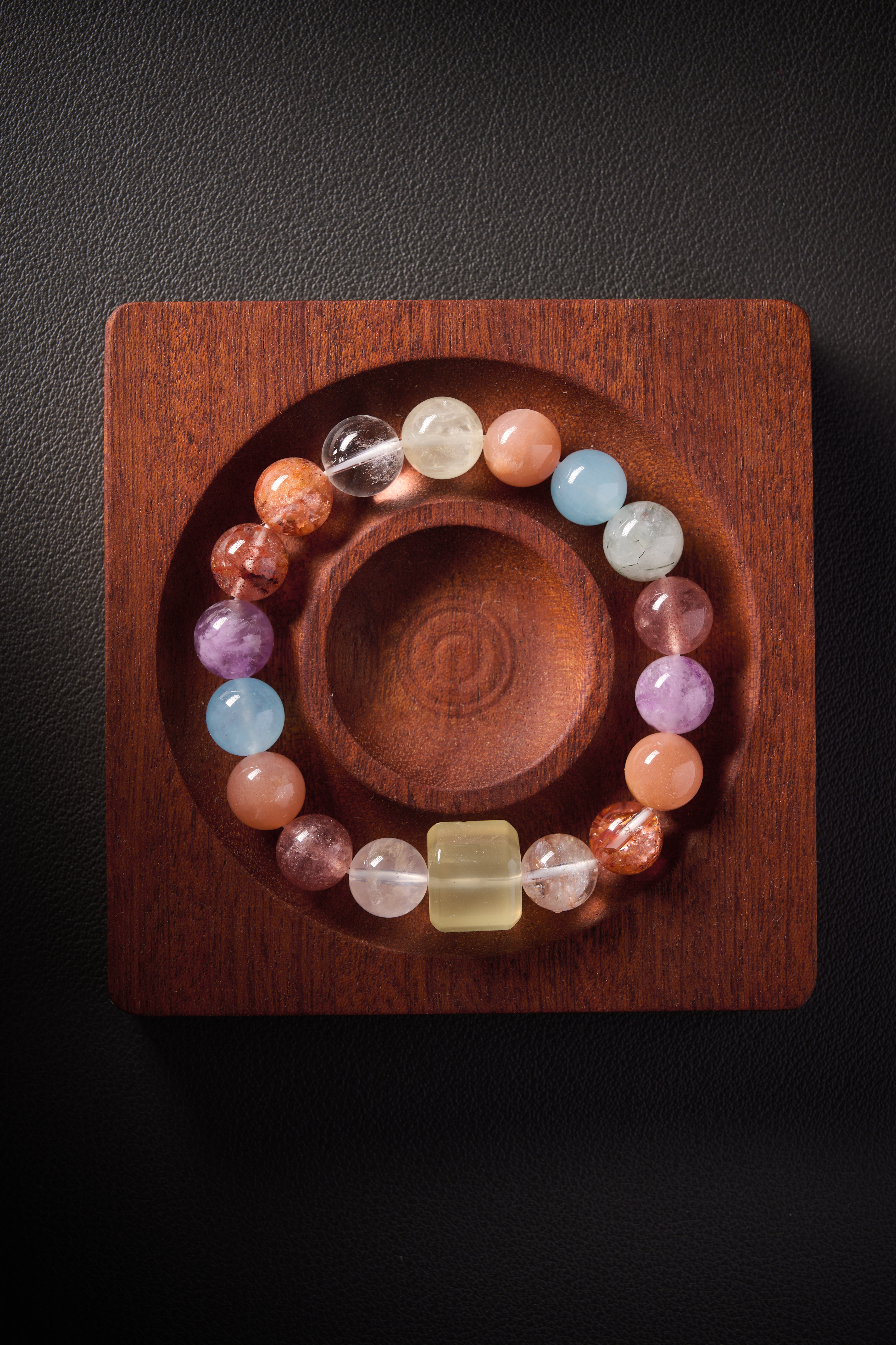 Angle view – full bracelet circle on elastic cord, evenly matched beads, handmade crystal jewelry.