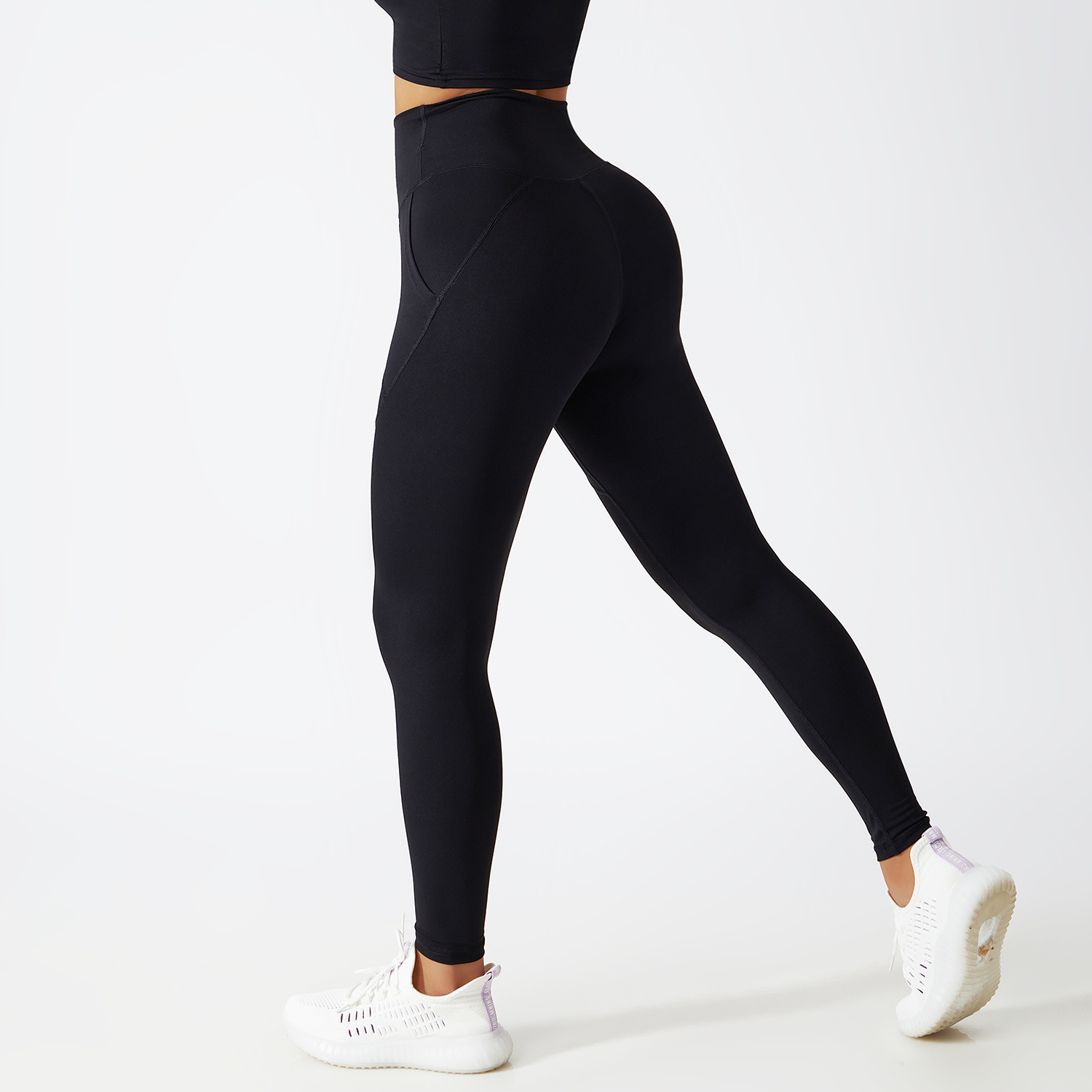 Buy Hergymclothing Black renewable fabric sustainable no front seam yoga leggings with side pockets at an affordable price