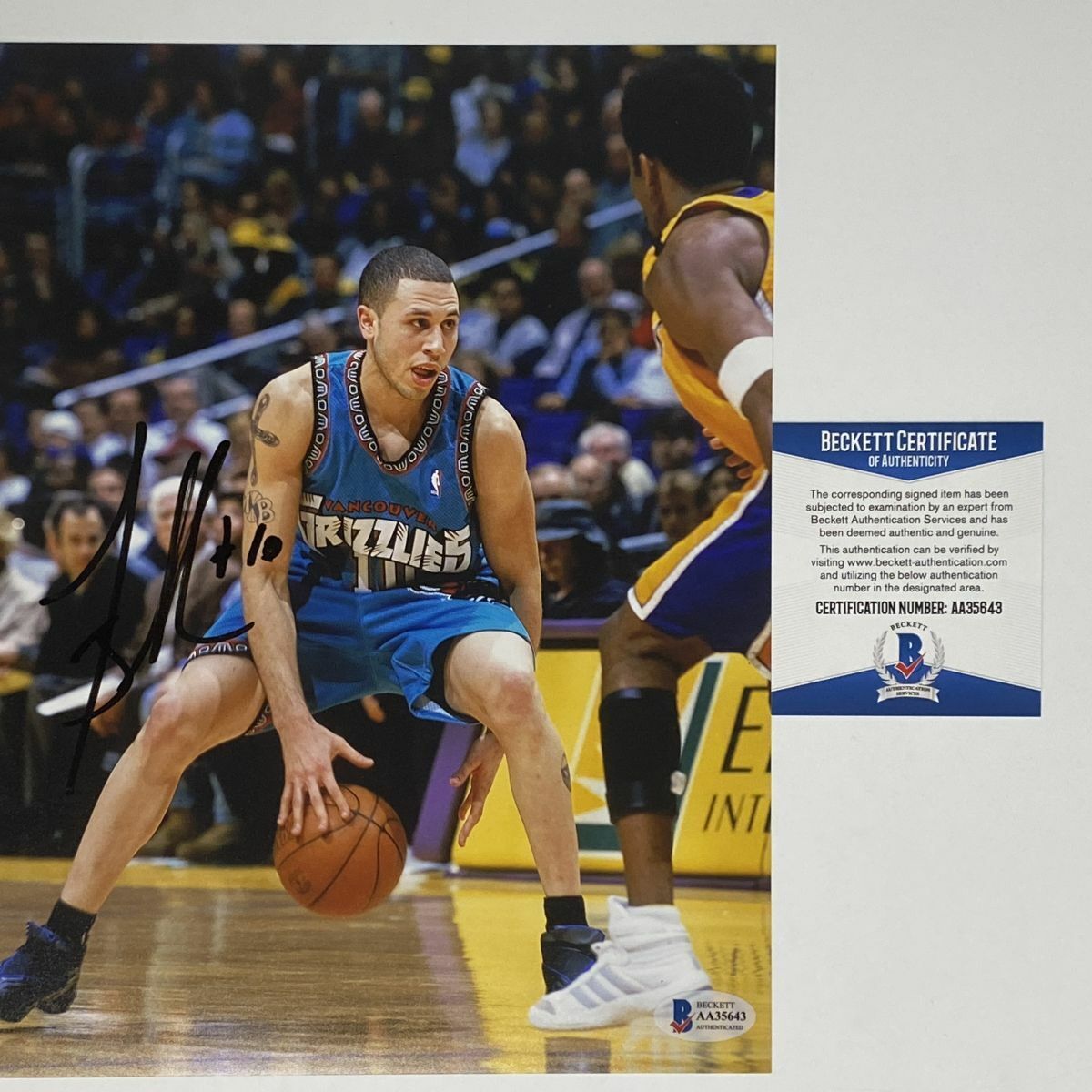 Autographed/Signed MIKE BIBBY Vancouver Grizzlies 8x10 Photo Poster painting Beckett BAS COA