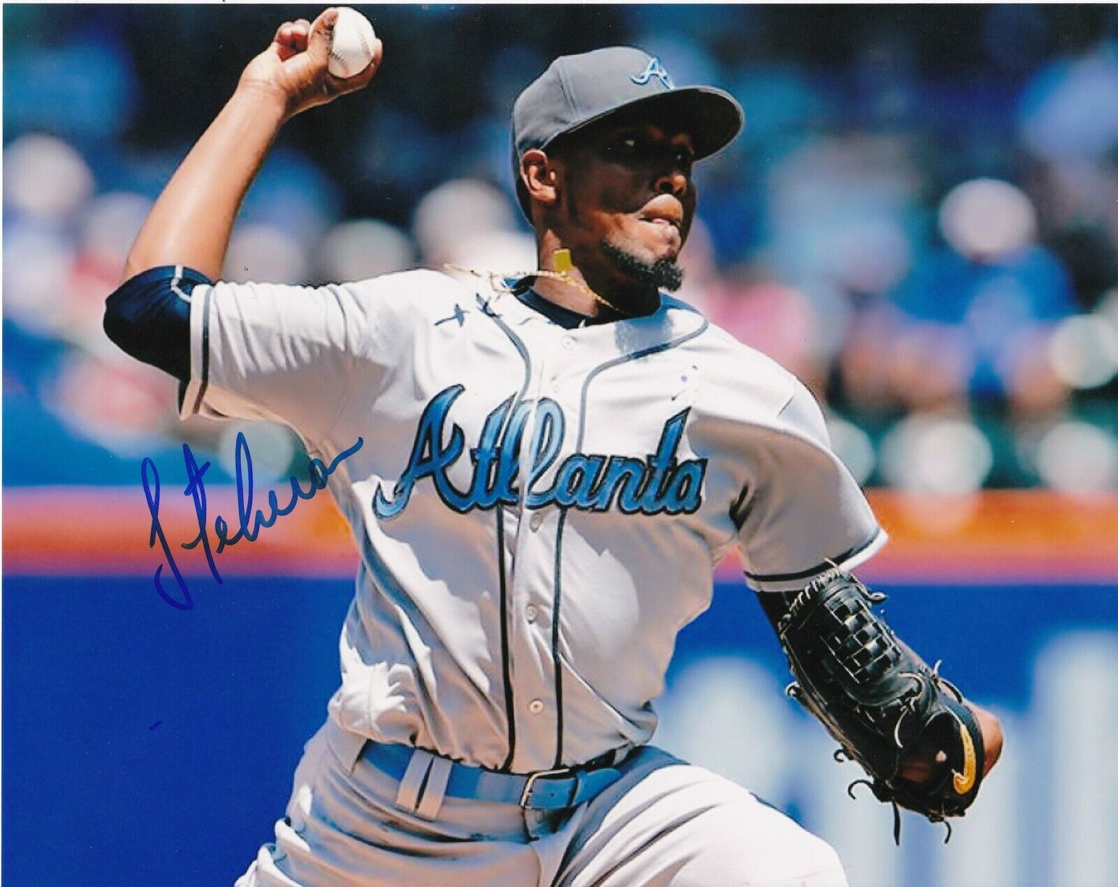 JULIO TEHERAN ATLANTA BRAVES ACTION SIGNED 8x10