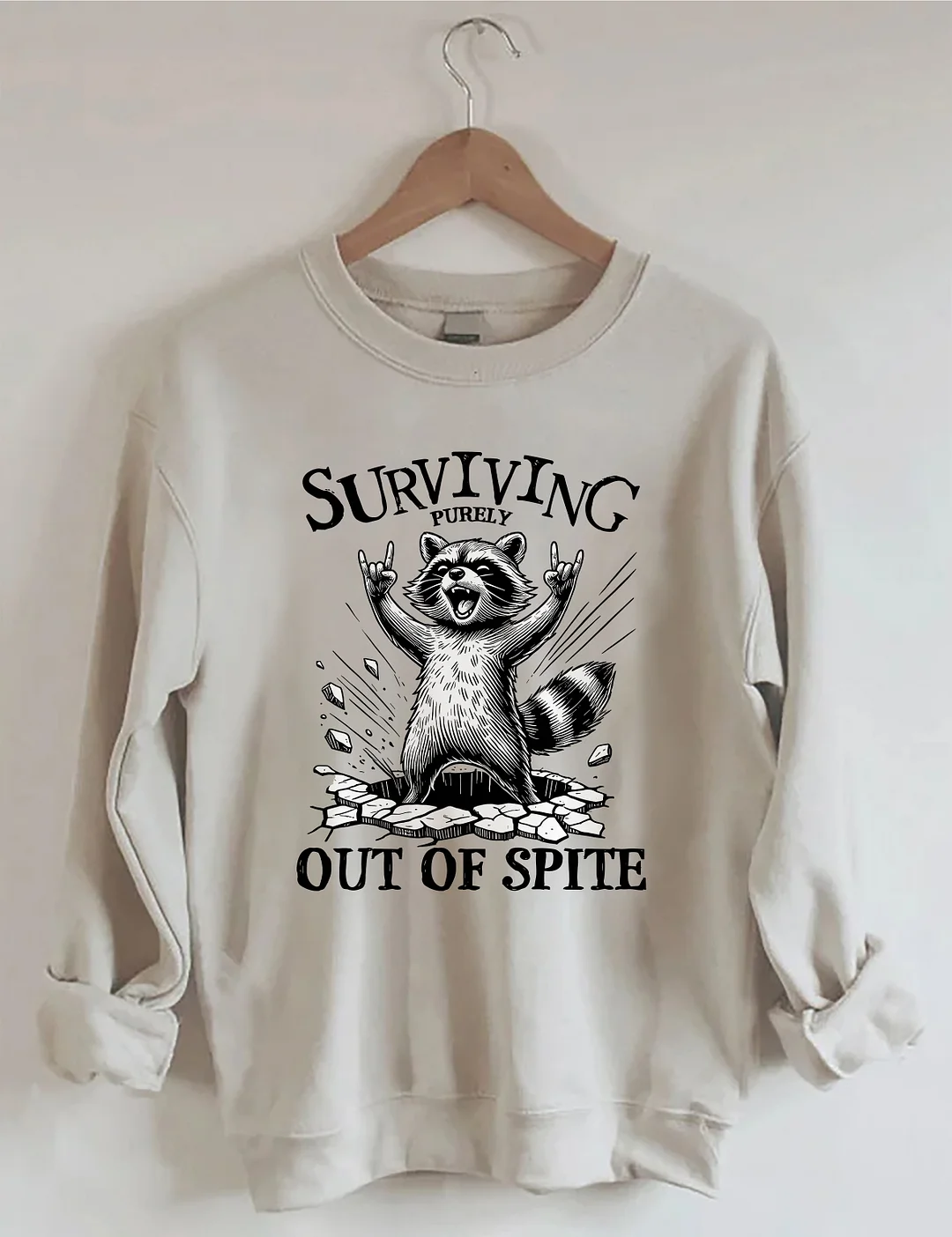 Surviving Purely Out Of Spite Raccoon Sweatshirt