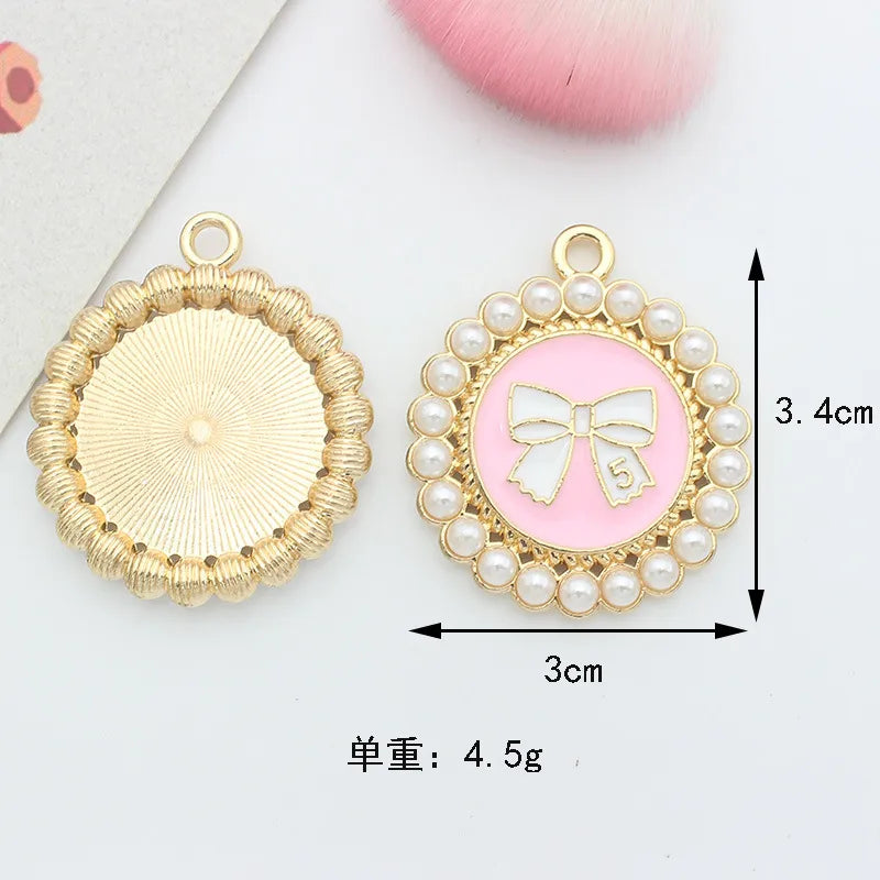 10 PCS/Package 1.5 * 20mm 14 * 14mm 7 * 12mm Alloy Rhinestones Pearl Number Heart Shape Bow Knot Polished Pendant