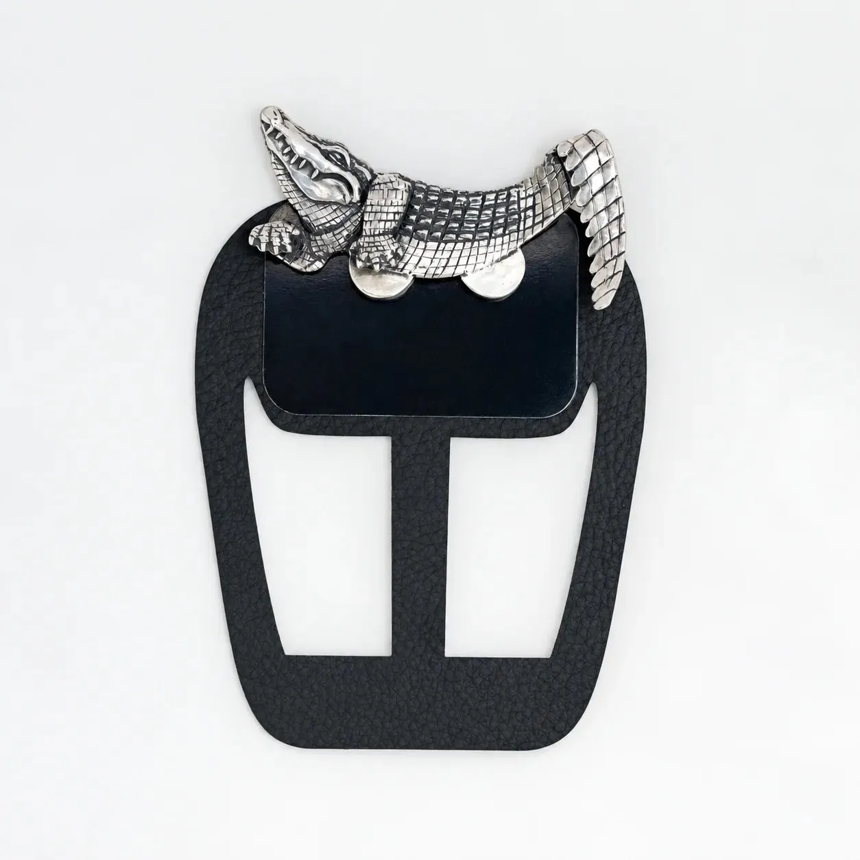 Alligator metal pocket square worn with a tailored suit