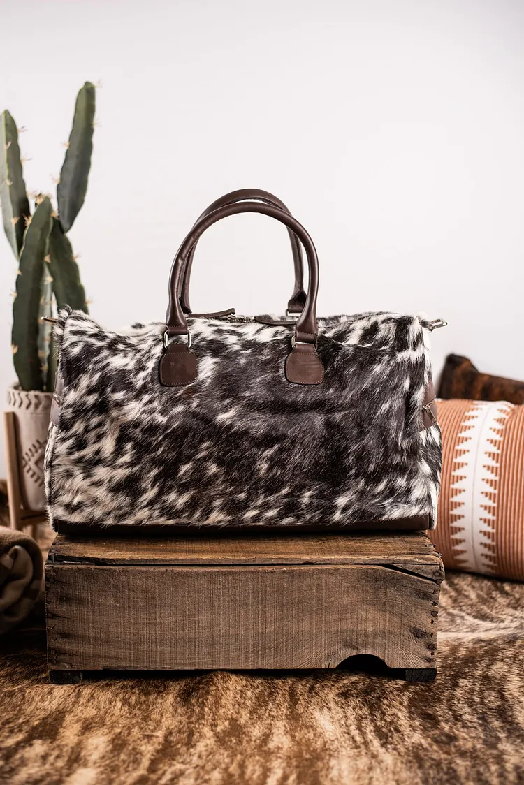 The Harold Cowhide Duffle Bags
