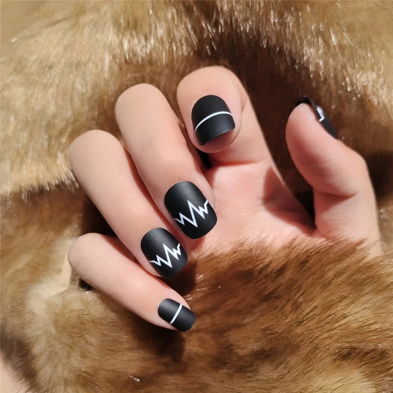 24Pcs Fake Nail Tips For Women Frosted Matte Nails with glue Nude with Black Love Heart Print designs Press On false fingernail-Nail Inspo