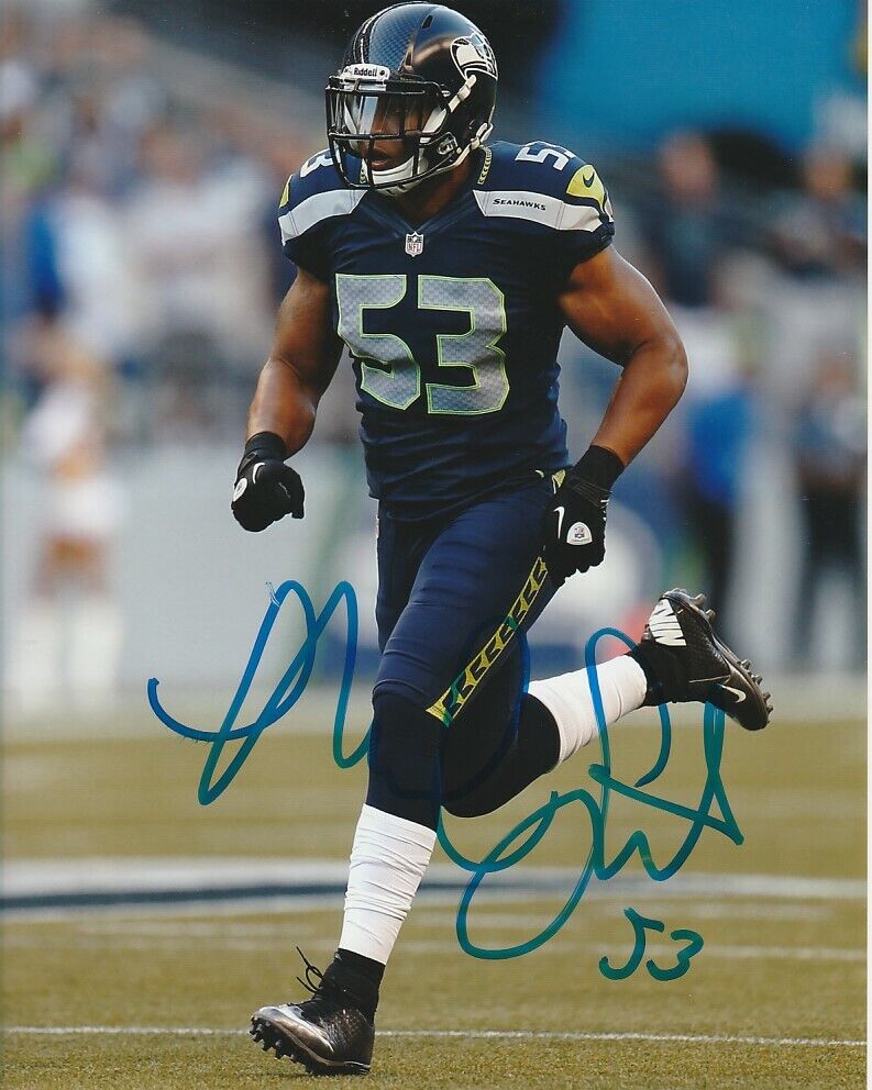 MALCOLM SMITH SIGNED SEATTLE SEAHAWKS FOOTBALL 8x10 Photo Poster painting #4 NFL SUPER BOWL MVP