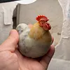 A plump, round rooster hand-carved from natural Shoushan stone, showcasing the natural colors and textures of the stone
