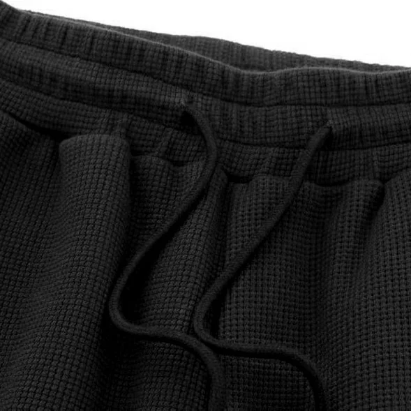 Black Cargo Pants with Side Pockets and White Sneakers