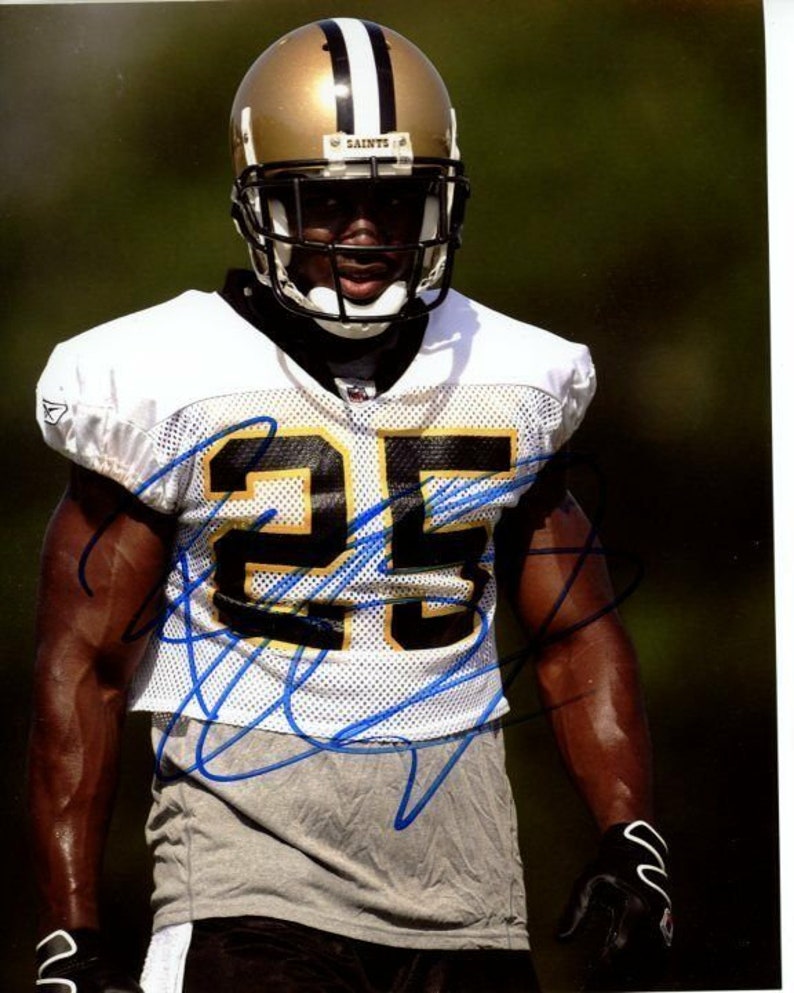 Reggie bush signed autographed nfl new orleans saints Photo Poster painting