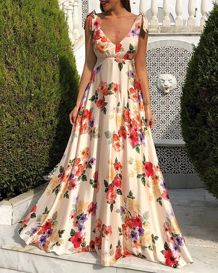Full-length sleeveless halter dress with flowered back