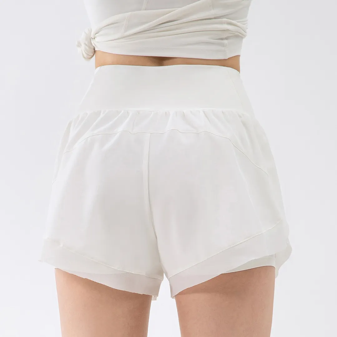 Buy different colors and types of skin friendly buttery soft anti wardrobe malfunction sports fitness workout 2 in 1 running shorts with inside pockets on Hergymclothing White