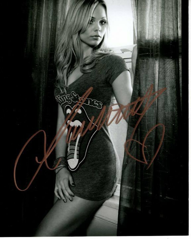 Laura vandervoort signed autographed the rolling stones t-shirt Photo Poster painting