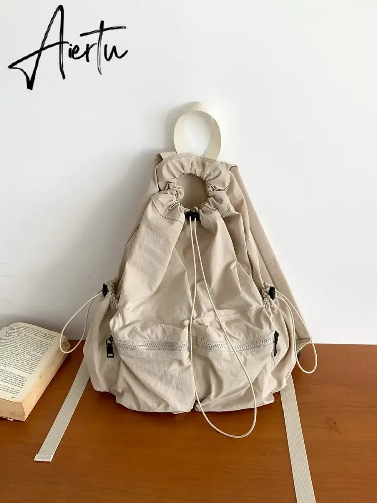 Light Drawstring Pocket Women Backpack Solid Color Nylon School Commuter Laptop Girls Bag Causal Korean Style Travel Backpack Aiertu