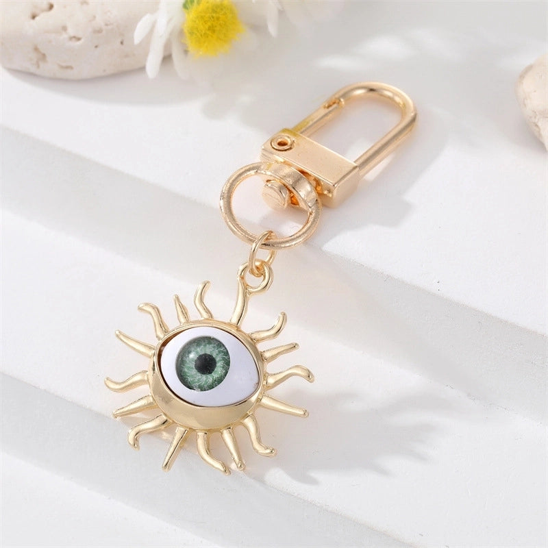 Alloy Base Support Diamond-embedded Colorful Devil's Eye Keychain Gold Electroplated Resin Patch Handbag Pendant