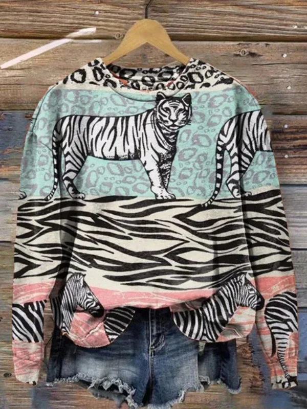 Women's Animal Print Long Sleeve Crewneck Sweatshirt.
