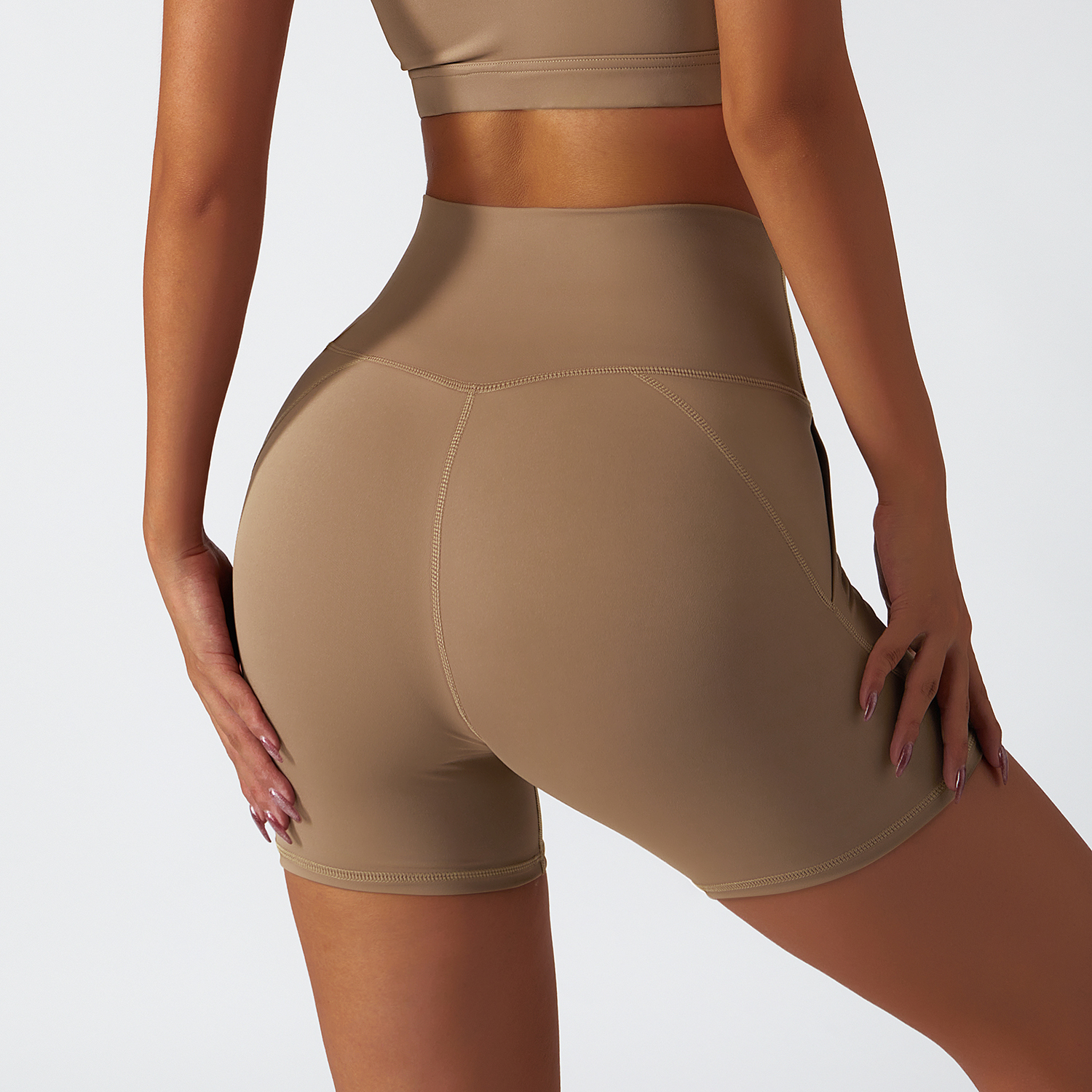 Buy Camel Brown renewable fabric sustainable no front seam yoga shorts with side pockets of high quality on Hergymclothing