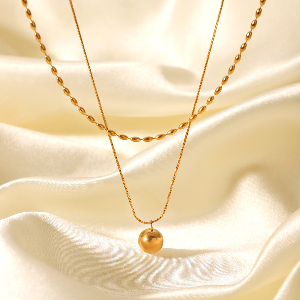Double-Layer Stainless Steel Necklace Oval Bead Chain Twisted Chain Small Gold Ball Pendant Necklace Titanium Steel Necklace