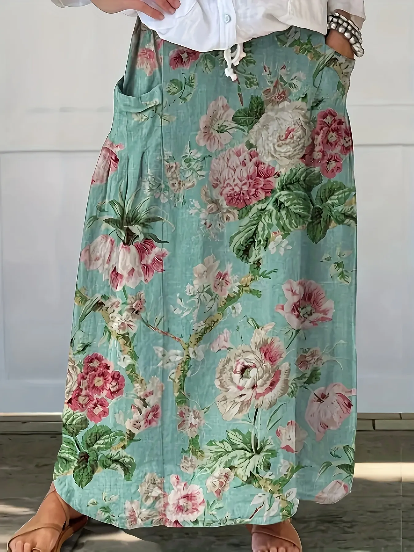 Elegant floral print polyester midi skirt with pockets light blue pink design regular fit