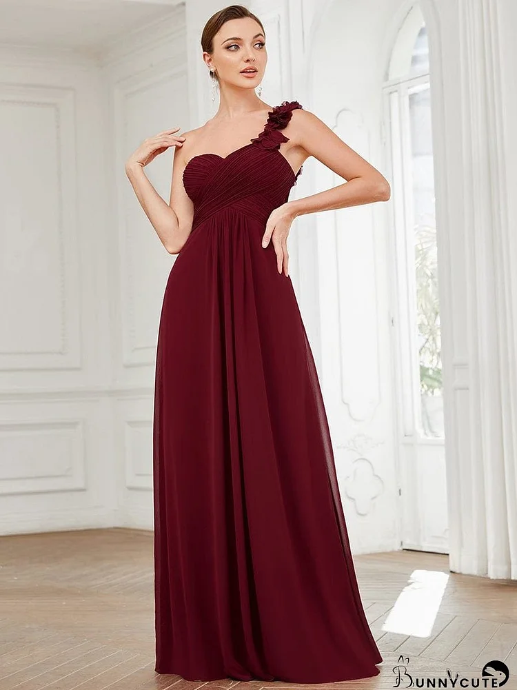 Elegant One-Shoulder Chiffon Bridesmaid Gown with Flower Detail