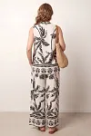 Back view of women's tropical print co-ord set showing relaxed fit and border print details