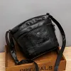 Sac &agrave; bandouli&egrave;re en cuir souple &agrave; pochettes multiples