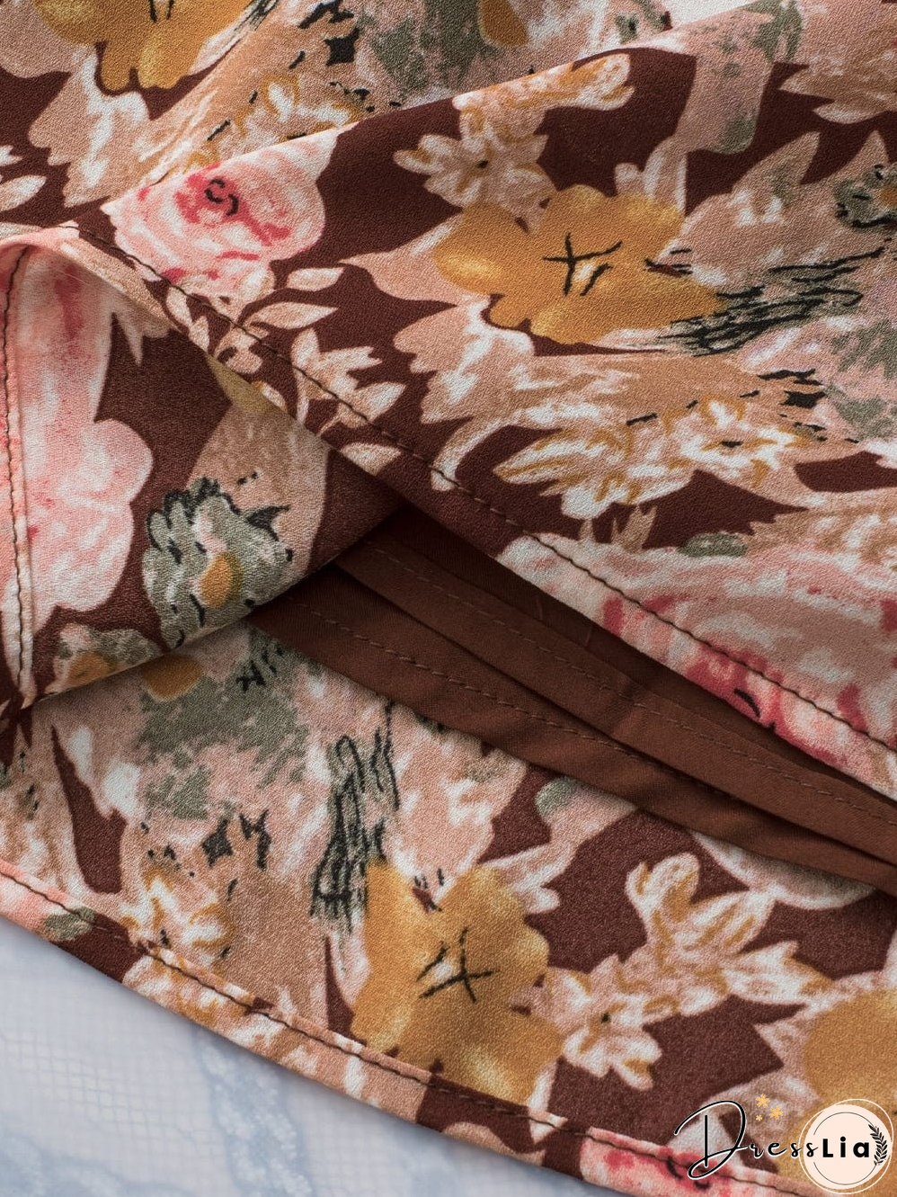 Short Sleeve Floral Blouse with Bubble Hem