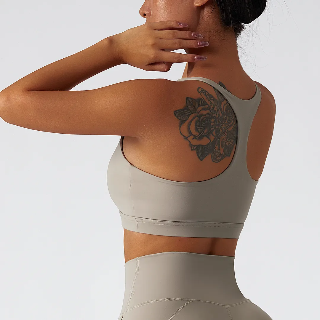 Shop Oat Milk sustainable recycled 4 way stretch ethically made naked feel high support racerback running sports bra with removable online on Hergymclothing