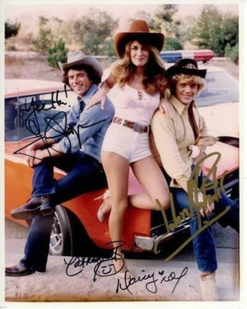 Tom wopat catherine bach john schneider signed the dukes of hazzard Photo Poster painting