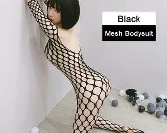 vibration therapy massage gun Sexy Lady in Suit From Sex Shop Lying on Checked Floor and Moving  Seductively Top View main image 1