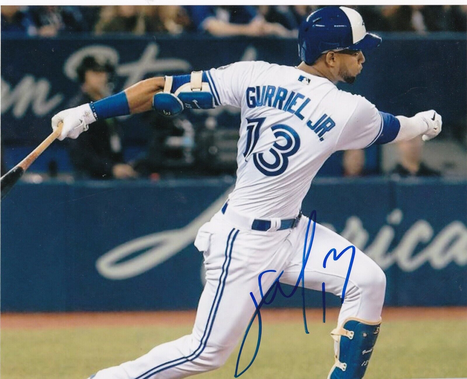 LOURDES GURRIEL JR TORONTO BLUE JAYS ACTION SIGNED 8x10