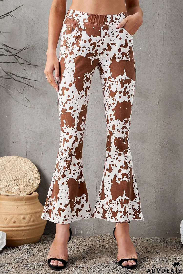 Cow Print High Waisted Flared Pants