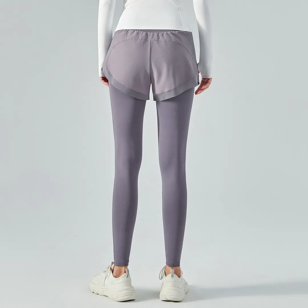 Buy Hergymclothing Smoky Purple fake 2 pieces high waist butt lifting pocket yoga leggings with shorts at an affordable price