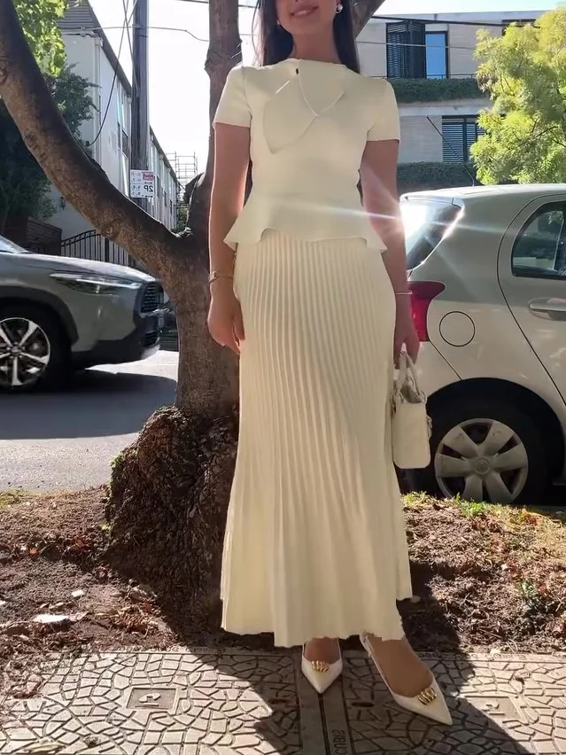 Elegant  Cream Peplum Top & Pleated Maxi Skirt Set