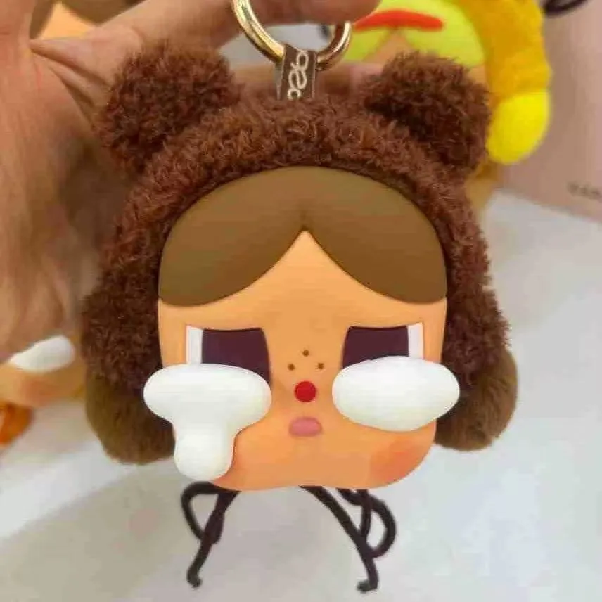 New crying baby earphone bag, vinyl face plush keychain, Southeast cross-border pendant, doll tide play series pendant batch